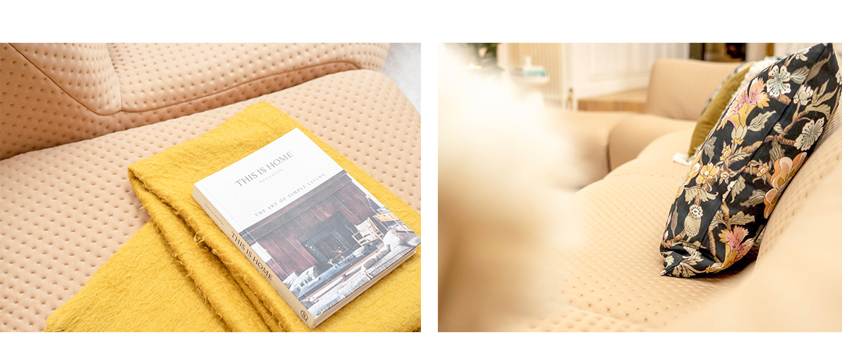 Close-ups of a tan textured sofa styled with a mustard throw, hardcover book and floral-patterned cushion, adding warmth and contrast.
