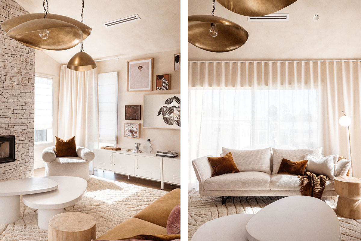 A neutral-toned sofa anchors a bright, modern living space, styled with complementary accent armchairs, coffee tables and bronze decor.